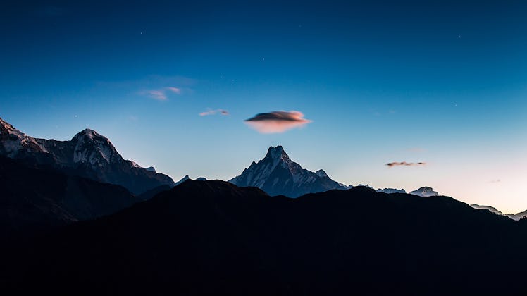 A cloud above the mountain that looks like the UFO