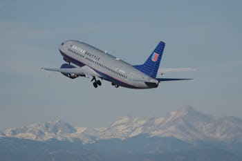 A United Airlines playing flying in the sky