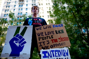 A picture of a guy holding transparent on Occupy Wall Street 