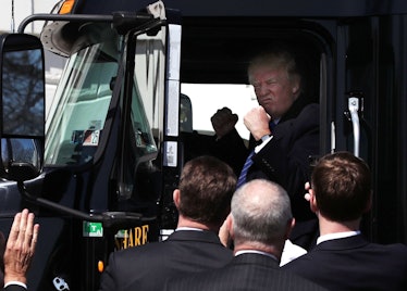 President Donald Trump pretended to drive a truck, and the photos were promptly memed.