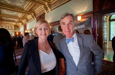 Shaughnessy Naughton posing for a photo with Bill Nye