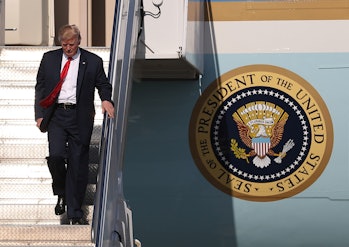 WEST PALM BEACH, FL - FEBRUARY 17: President Donald Trump walks down the stairs after arriving on Ai...