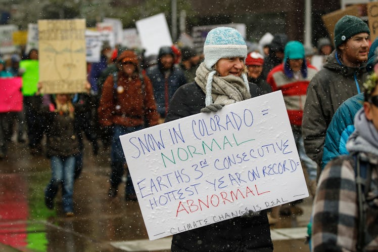 Thousands of protestors march around downtown Denver at the People's Climate March on Denver on Apri...