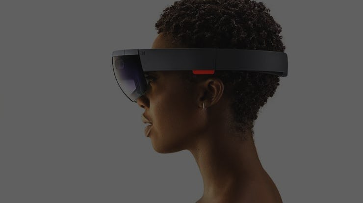 A woman using smart glasses for augmented reality phone calls.