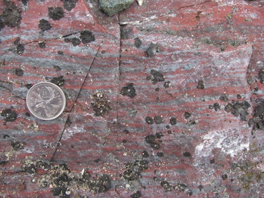 Jasper banded iron formation from the Nuvvuagittuq Supracrustal Belt in Québec, Canada, with grey ma...