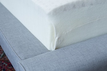 The Leesa mattress with its cloth cover removed. You can see the egg-crate–like top layer of Avena c...