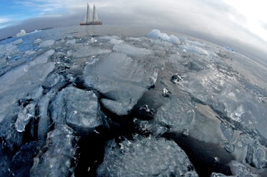 schooner sailing through ice in the water
