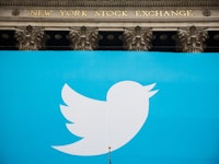 A large Twitter in front of the New York Stock Exchange building