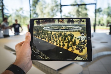 An iPad using augmented reality.