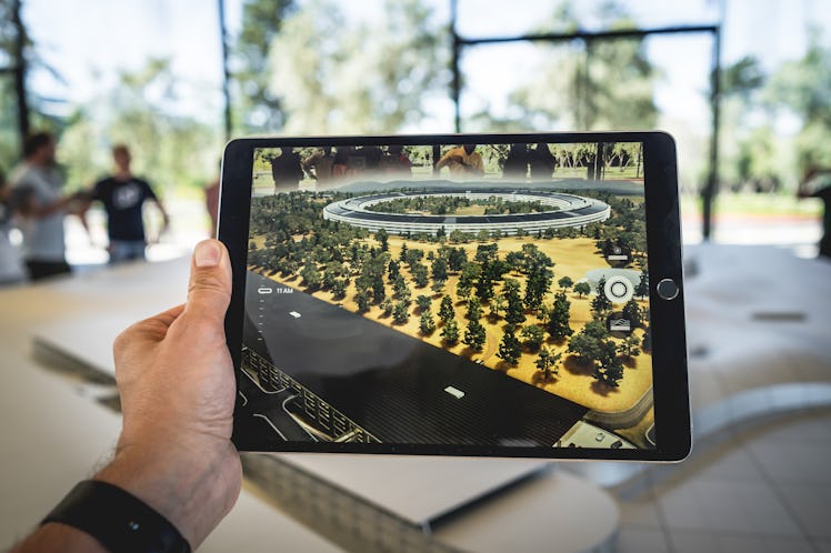 An iPad using augmented reality.