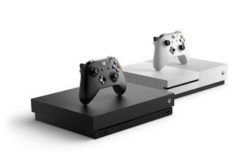 The Xbox One X pictured next to the Xbox One S.