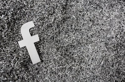 Facebook logo's 'f' on grass in black and white representing the Mark Zuckerberg testimony
