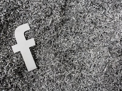 Facebook logo's 'f' on grass in black and white representing the Mark Zuckerberg testimony