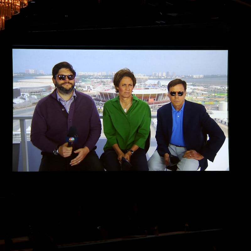 Three Olympic commentators sitting during a show