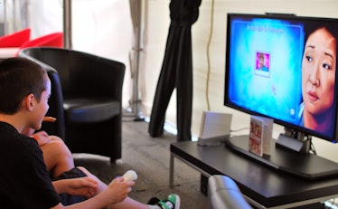 Boy playing wii game