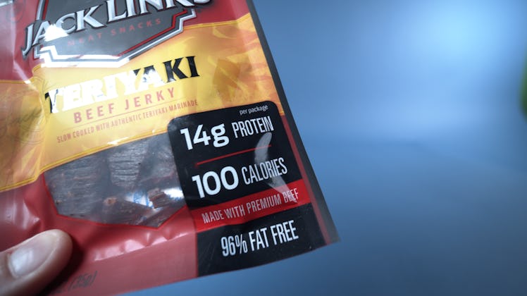 This bag of beef jerky notes its calorie count on the front, beneath its protein and above the adver...