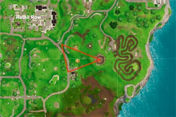 The Week 8 "Search Between" location in 'Fortnite: Battle Royale' is located just southeast of Retai...