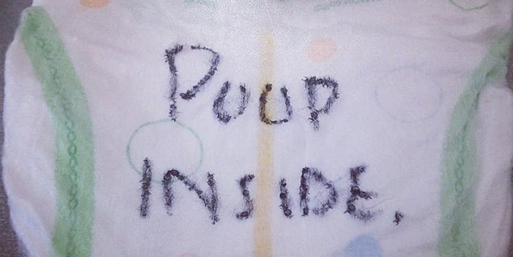Diaper with a "poop inside" text