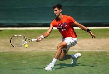 LONDON, ENGLAND - JULY 02: Novak Djokovic of Serbia in action during practice ahead of the Wimbledon...