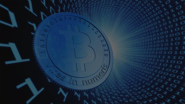 A digital illustration of a Bitcoin in a spherical shape in black and blue.