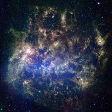 This vibrant image from NASA’s Spitzer Space Telescope shows the Large Magellanic Cloud, a satellite...
