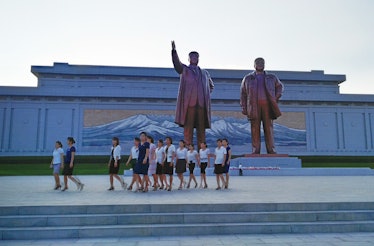 PYONGYANG, NORTH KOREA - AUGUST 23: North Koreans visit the Mansudae Grand Monument on August 23, 20...