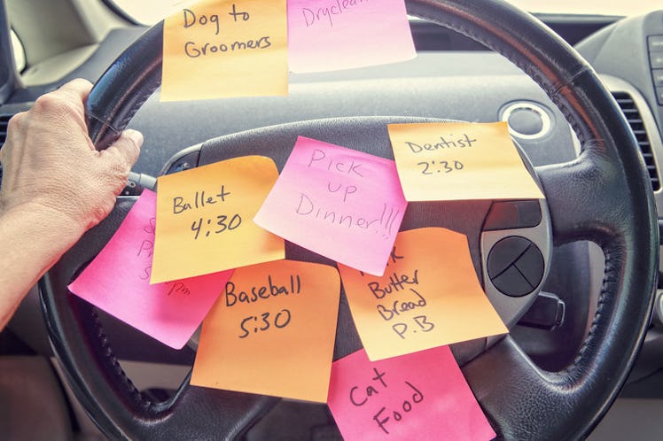 car post-it sticky note reminders steering wheel