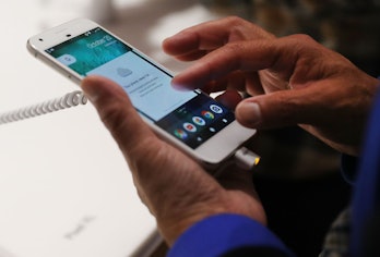 A person tries a new Google Pixel phone at the Google pop-up shop in the SoHo neighborhood on Octobe...