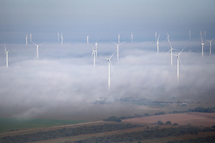 The fog lifts as windmills turn near the U.S.-Mexico border.