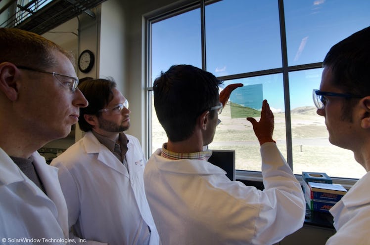 Researchers view the Colorado rocky mountains through SolarWindow glass.