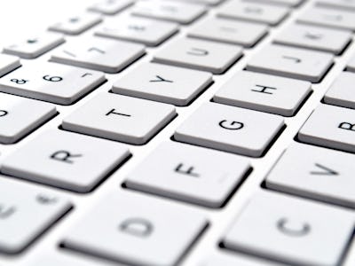 Close up of keys from a white keyboard