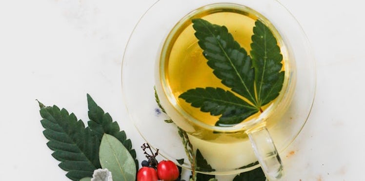 A tea with a leaf inside