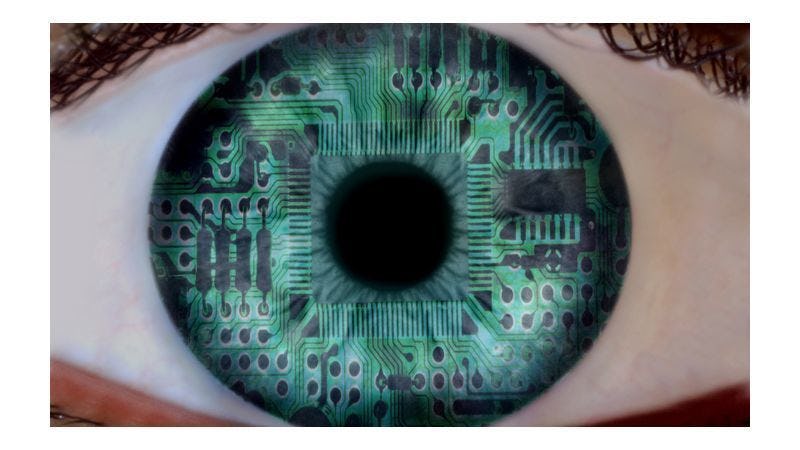 A close-up of a green-blue eye with a digital imprint effect representing cybersecurity