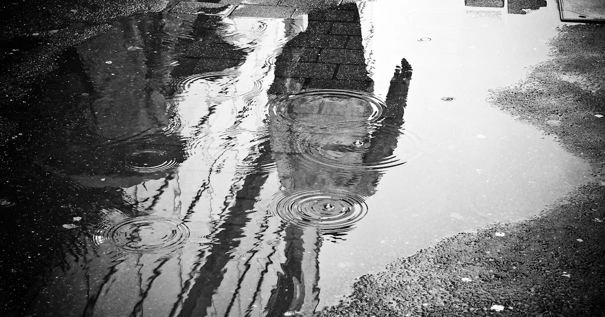 The Mathematics of What Happens When a Raindrop Hits a Puddle