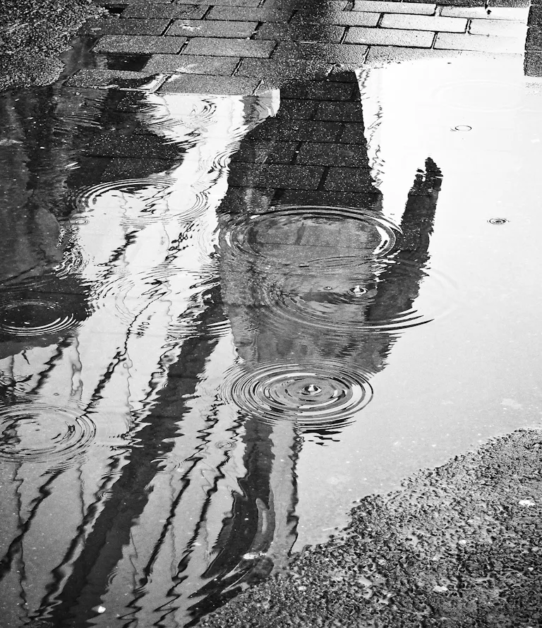 The Mathematics of What Happens When a Raindrop Hits a Puddle