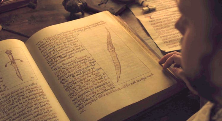 Sam reads up on the Dragonglass decoration customs of House Targaryen.