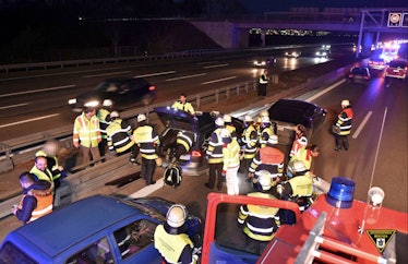 Firefighters in Munich, Germany, respond to the crash where a Tesla Model S stopped an out of contro...