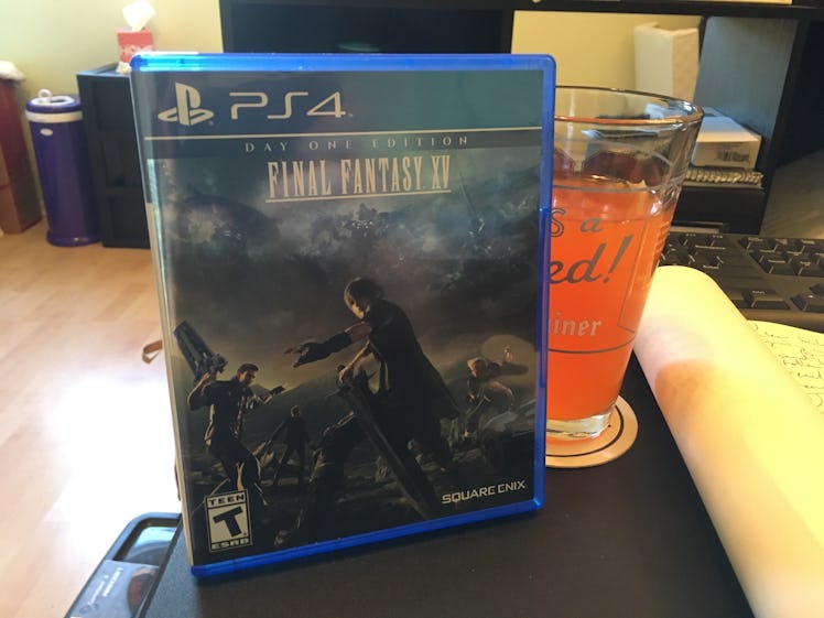  'Final Fantasy XV' Play Station 4 game and a glass of Wiz soda.