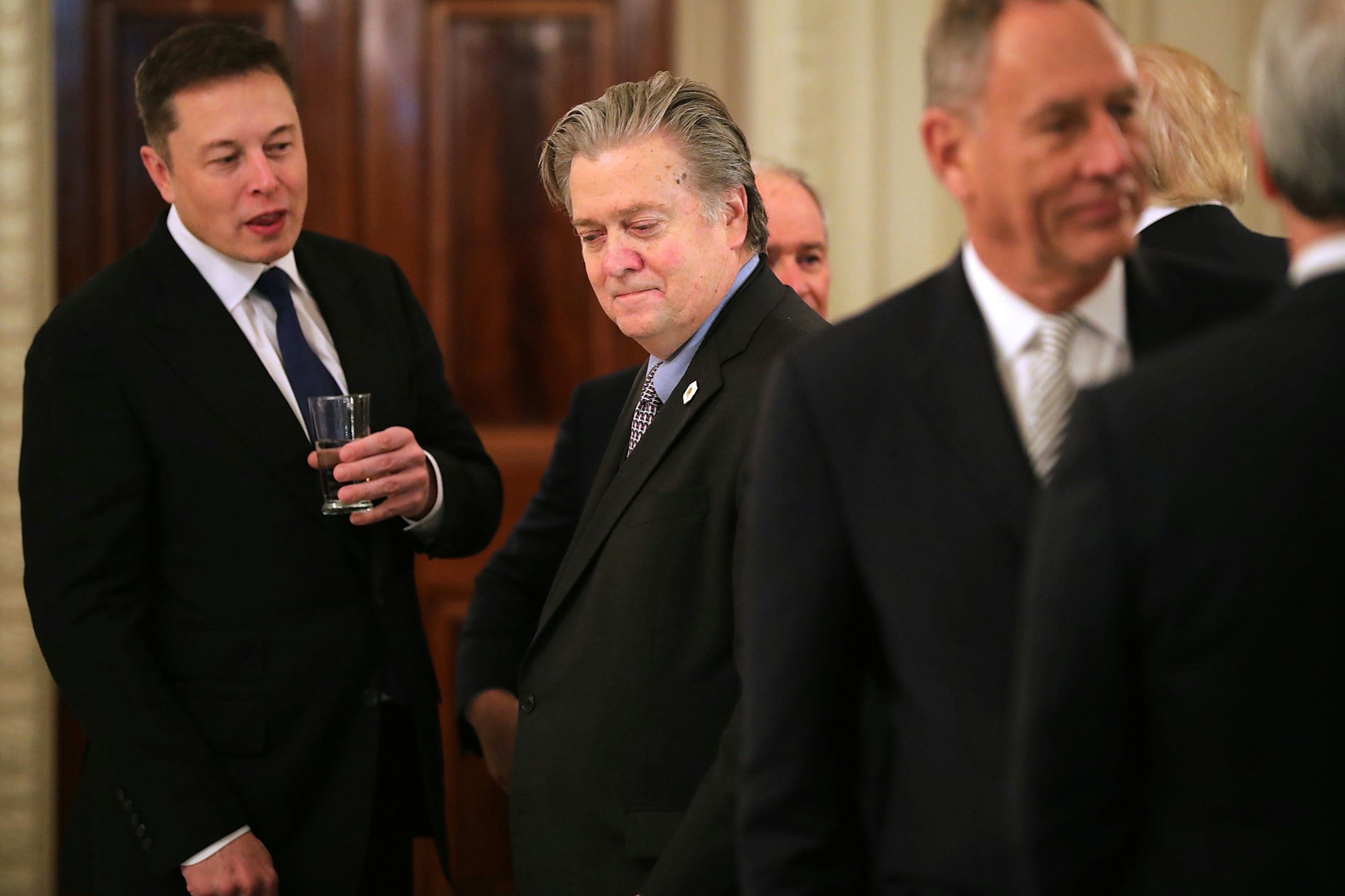 What Is Elon Musk Telling Steve Bannon In This Photo? A Few Guesses