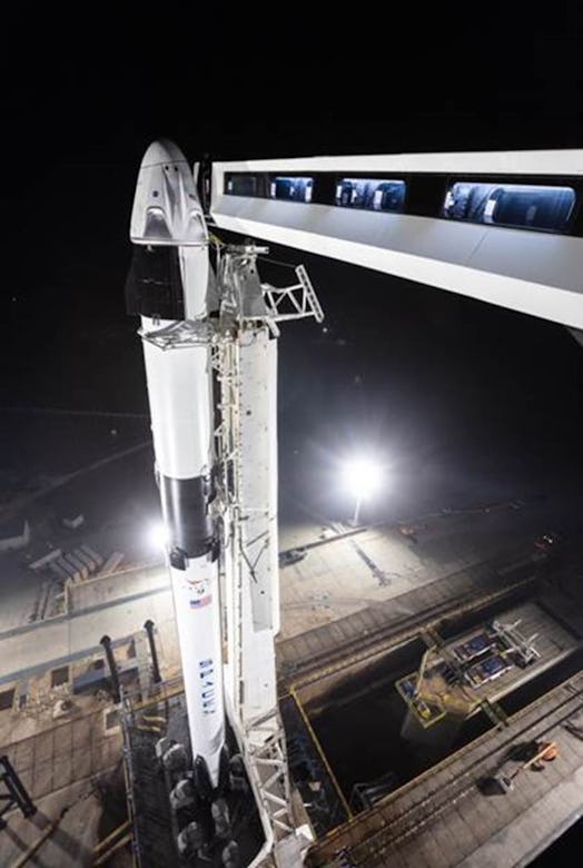 SpaceX's Crew Dragon ready on platform.