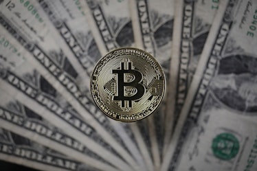 Bitcoin sits alongside U.S. dollars.