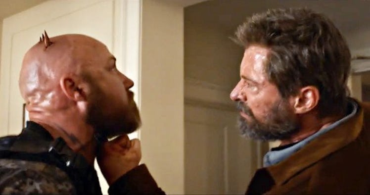 Hugh Jackman slices into a dude's skull as Wolverine in 'Logan'.