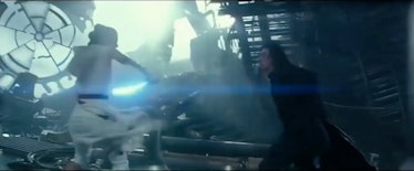 Does Rey aim to slash a defenseless Kylo Ren in the chest here?
