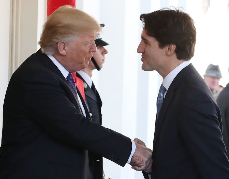 WASHINGTON, DC - FEBRUARY 13: U.S. President Donald Trump (L), greets Canadian Prime Minister Justin...