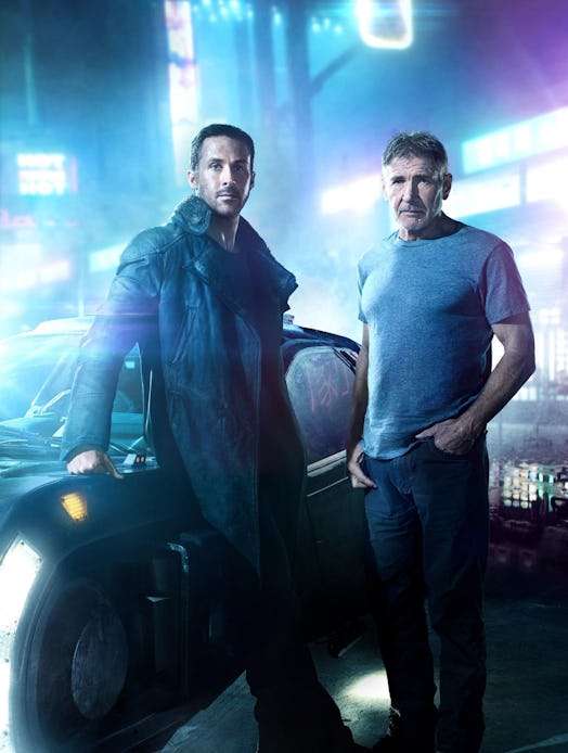 ford and gosling standing by a car