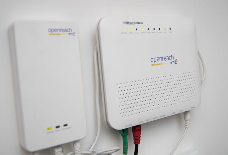 An BT Openreach fiber modem inside a home. The company's stock dropped by 4% after the announcement ...
