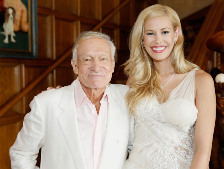 HOLMBY HILLS, CA - MAY 15: Playboy Founder and Editor in Chief Hugh M. Hefner (L) and 2014 Playmate ...