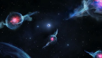 Artist’s impression of G objects, with the reddish centers, orbiting the supermassive black hole at ...
