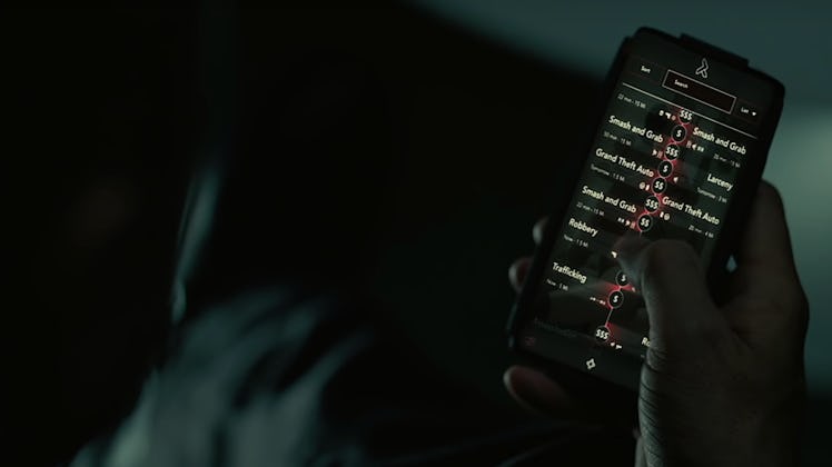Still from Westworld III with phone full of criminal activity