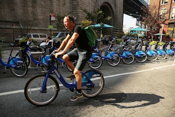 A man rides a bike through Dumbo on October 4, 2013 in the Brooklyn borough of New York City. A grou...